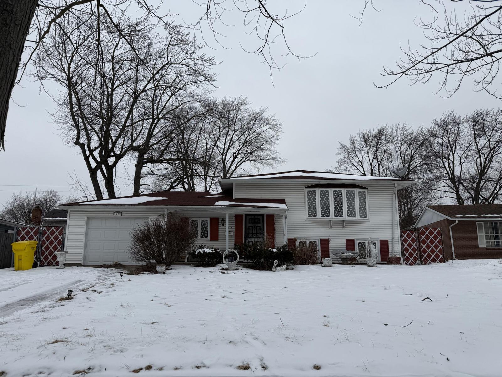 Before: Griffith home exterior in winter