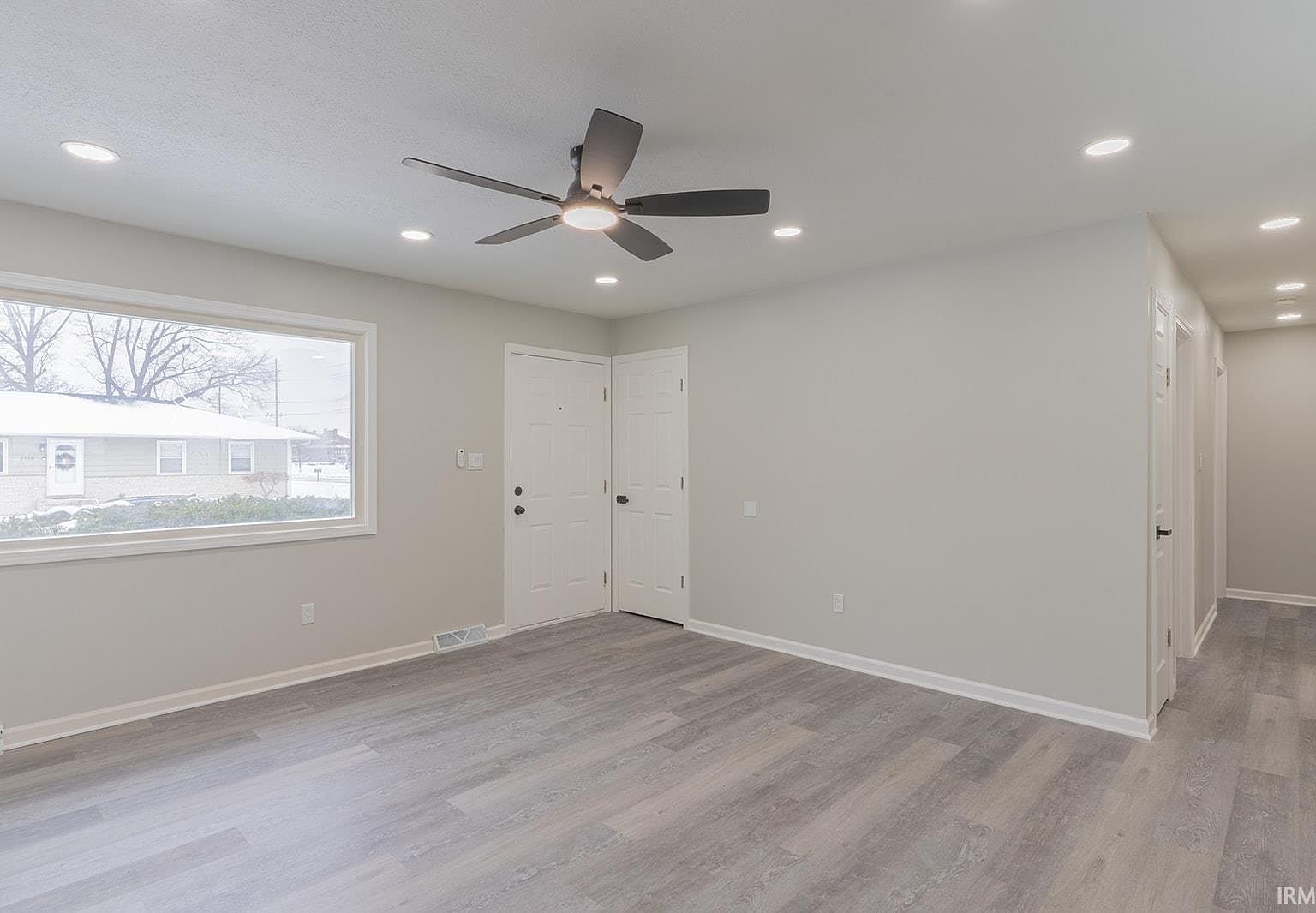 Whole home remodel room with finished flooring